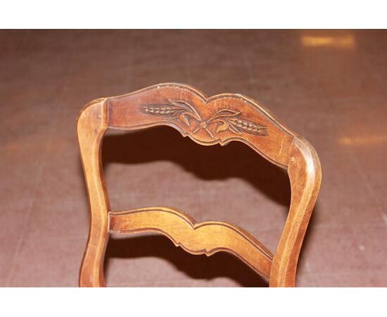 Gruppo di 10 sedie francesi stile Provenzali in legno di noce riccamente intagliati