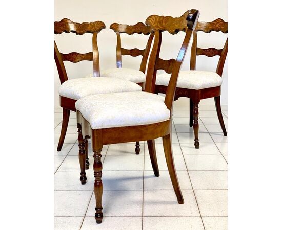 Group of four Charles X inlaid chairs. Early 19th century     