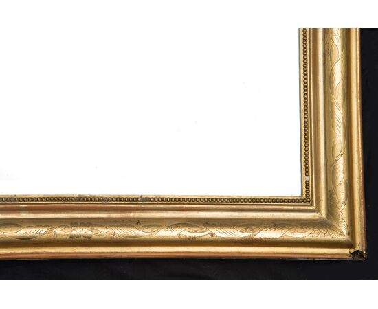 Specchiera/caminiera antica Napoleone III Francese in legno dorato. Periodo XIX secolo.