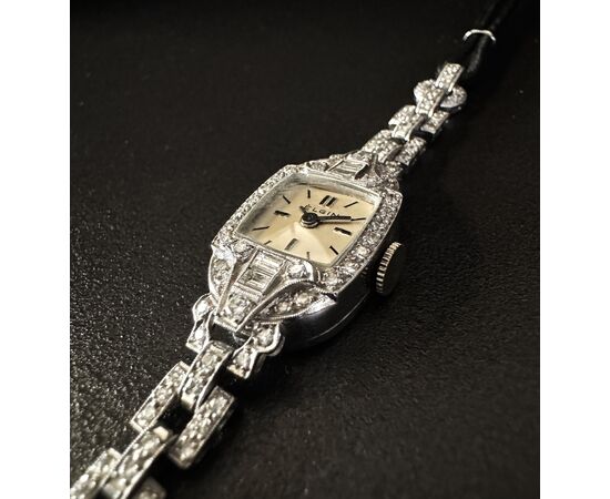 Orologio  -  bracciale  in  platino  con  Diamanti. 1.5  ct.