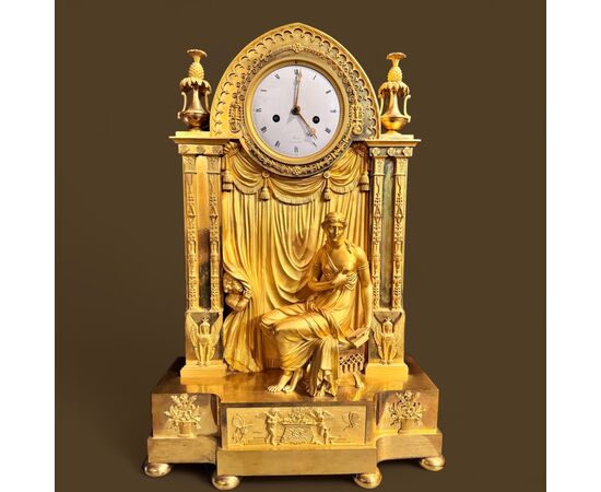 Straordinario orologio in bronzo dorato