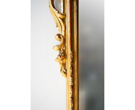 Specchiera antica in legno dorato intagliato
