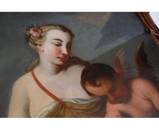 Dipinto raffigurante figura femminile con Eros ,cornice mossa lignea