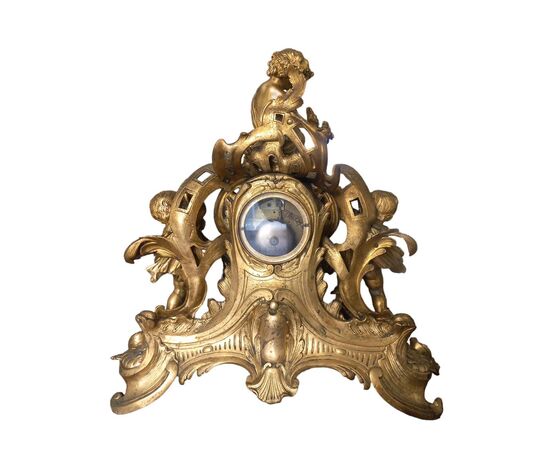 Orologio da tavolo in bronzo dorato e cesallato