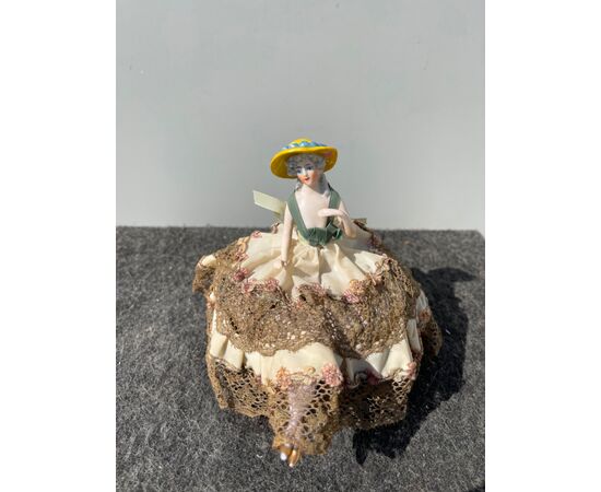 Porcelain half doll powder box with a lady figure. France or Germany.     