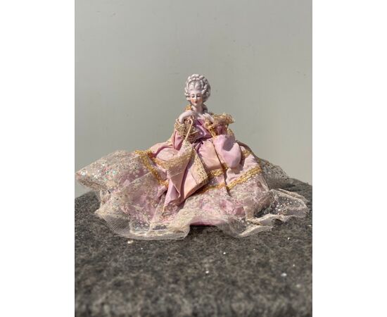 Porcelain half doll powder box with figure of lady with parasol. France or Germany.     