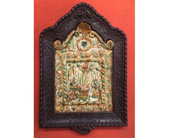 devotional panel with nativity scene in engobed style. Apulian area, 17th century. Frame from the 19th century.     