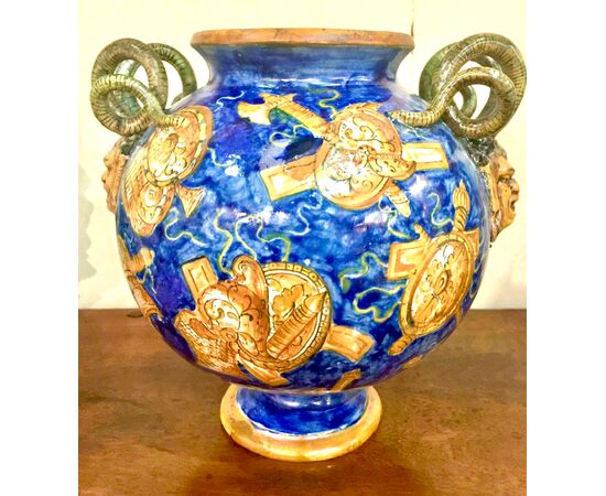 Metallic luster globular vase decorated with trophies in the Casteldurante style with snake and mascaron sockets.Signed and dated 1881.Angelo Minghetti, Bologna.     