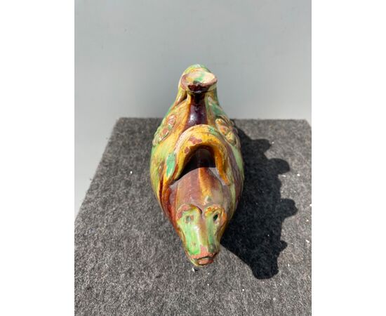 Water bottle in the shape of a stylized fish in glazed and engobed terracotta. Seminara Calabra.     