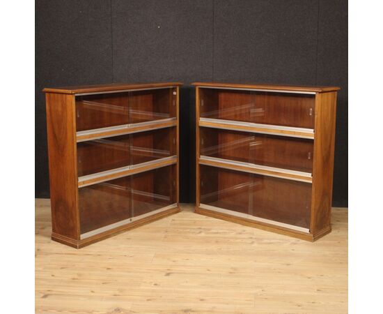 Pair of Italian bookcases in walnut wood with glass doors