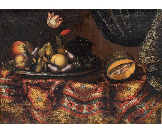 Cerchia di Francesco Noletti detto il Maltese (1611 ca. – 1654), Natura morta con frutta, fiori e tappeto