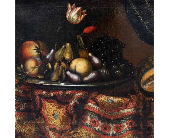 Cerchia di Francesco Noletti detto il Maltese (1611 ca. – 1654), Natura morta con frutta, fiori e tappeto