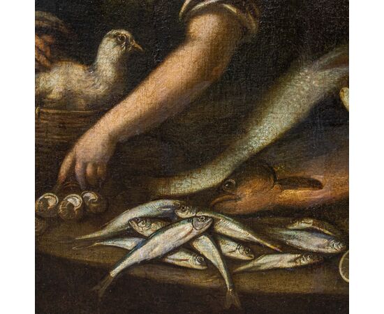 Scuola emiliana, XVII secolo, Coppia di pescatori con nature morte di pesci