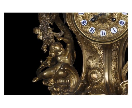 Stupendo orologio in bronzo dorato in stile barocco francese del 1800 con putti