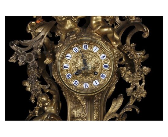 Stupendo orologio in bronzo dorato in stile barocco francese del 1800 con putti