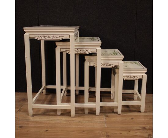 Four French coffee tables in lacquered and painted wood