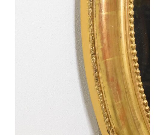 SPECCHIO ANTICO OVALE CON CIMASA, FIORI E VOLUTE, SPECCHIERA  ANTICA, CORNICE DORATA, DEL XIX SECOLO. (SPO171)