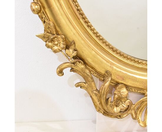 SPECCHIO ANTICO OVALE CON CIMASA, FIORI E VOLUTE, SPECCHIERA  ANTICA, CORNICE DORATA, DEL XIX SECOLO. (SPO171)
