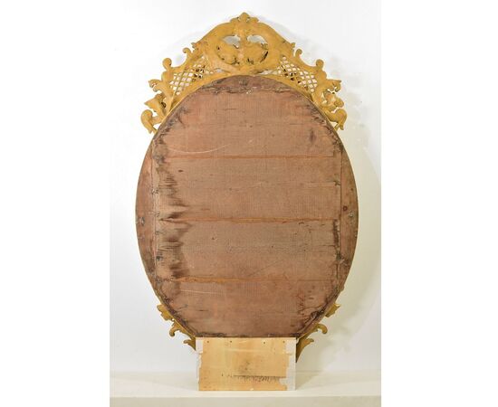 SPECCHIO ANTICO OVALE CON CIMASA, FIORI E VOLUTE, SPECCHIERA  ANTICA, CORNICE DORATA, DEL XIX SECOLO. (SPO171)