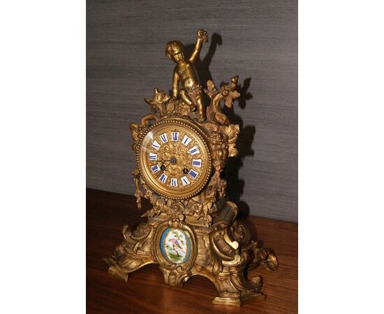 Orologio in bronzo del 1800 con medaglione in porcellana di sevres