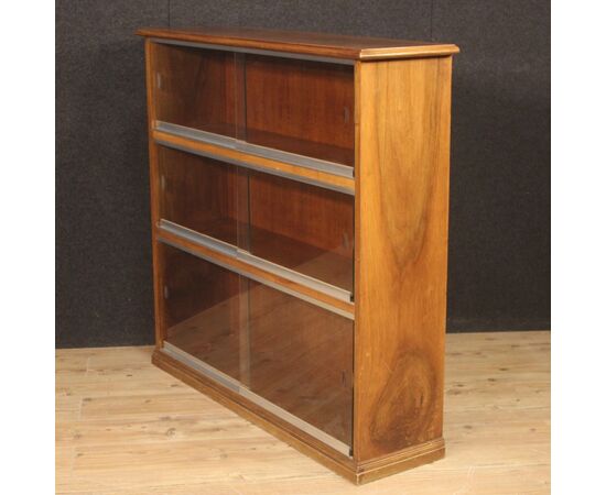 Pair of Italian bookcases in walnut wood with glass doors