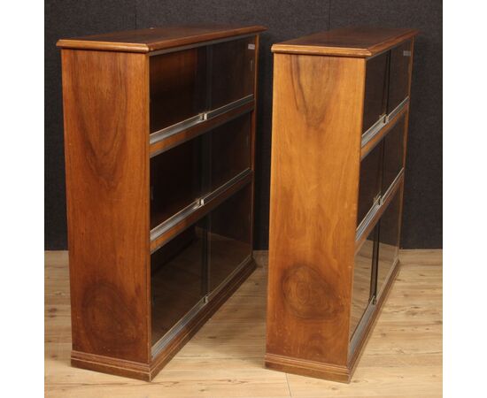 Pair of Italian bookcases in walnut wood with glass doors