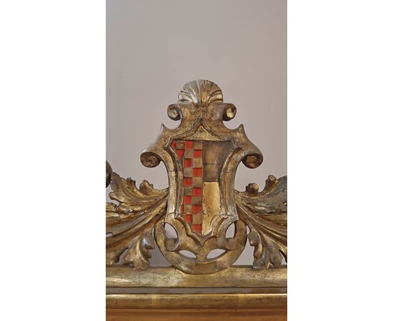 EARLY 19th CENTURY GOLDEN MIRROR WITH COAT OF ARMS