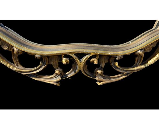 Specchiera in legno intagliato e foglia oro con motivi floreali,rocaille e uccelli.periodo Art nouveau.