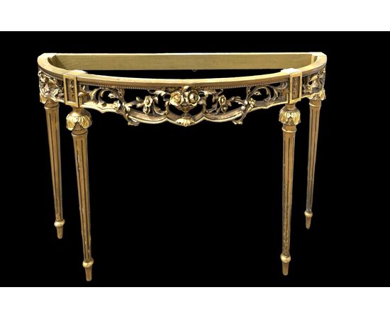 Consolle in legno intagliato e foglia oro con motivi floreali e rocaille .Piano in marmo policromo.Periodo Art Nouveau.