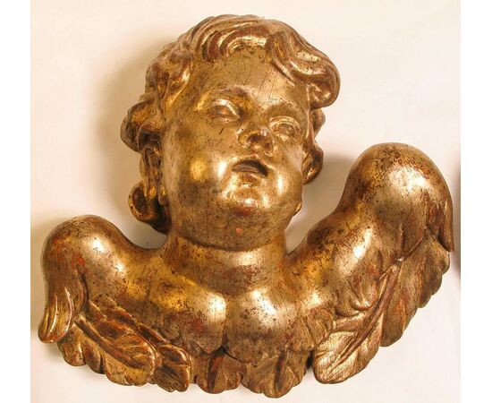 pair of eighteenth-century angels in gilded wood     