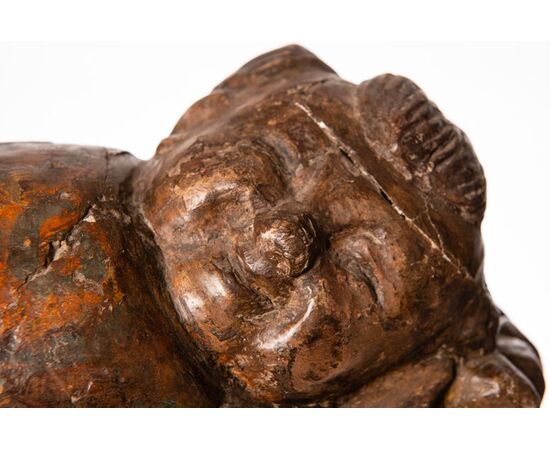 Ancient wooden sculpture &quot;sleeping girl&quot;     