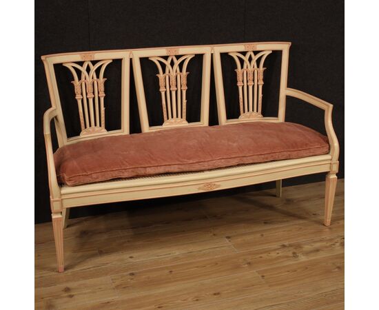 Sofa in lacquered and painted wood in Louis XVI style