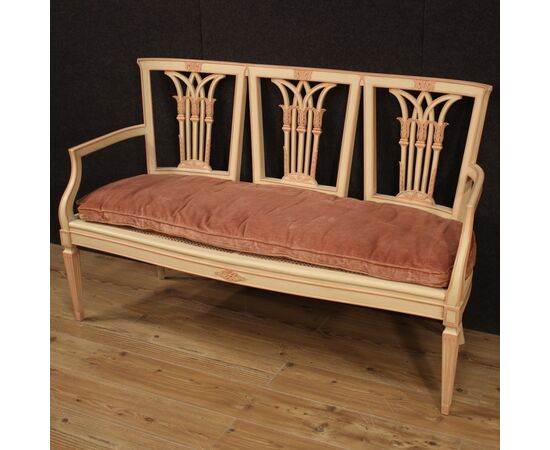 Sofa in lacquered and painted wood in Louis XVI style