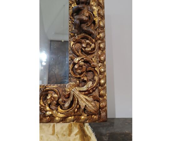 CORNICE IN LEGNO DORATO CON CUPIDI SECONDA META’ XVI SECOLO