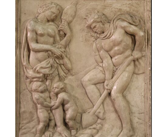 Bas-relief sculpture in plaster, Adam and Eve at work