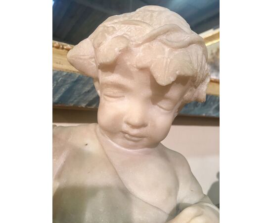 Sculpture of a child in marble of the 19th century     