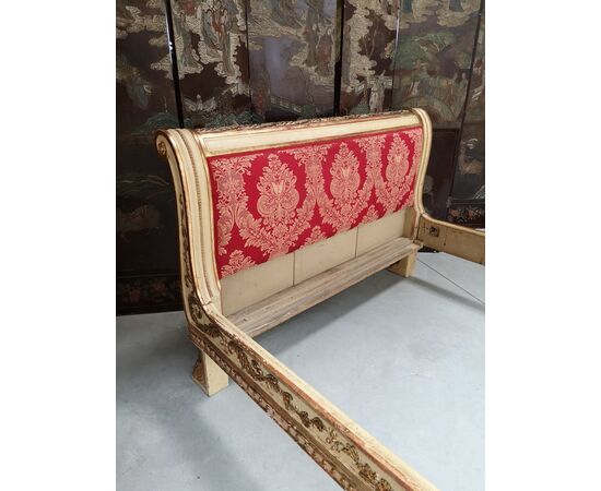 Bed in carved lacquered and gilded wood     