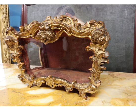 Case in gilded wood, epoch: XVIII century.     