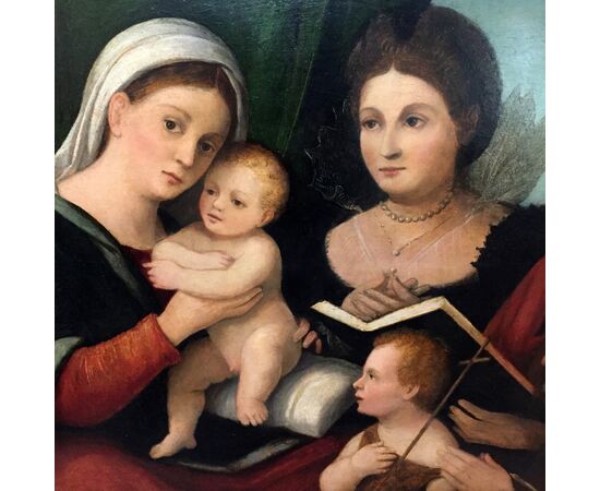 Madonna and Child, San Giovannino and patrons, Venetian school.     