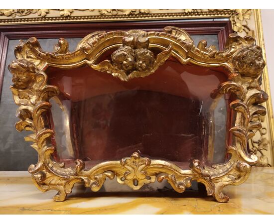 Case in gilded wood, epoch: XVIII century.     