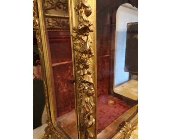 Case in gilded wood     