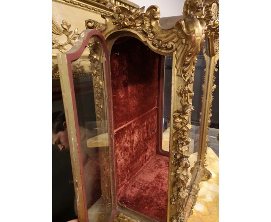 Case in gilded wood     