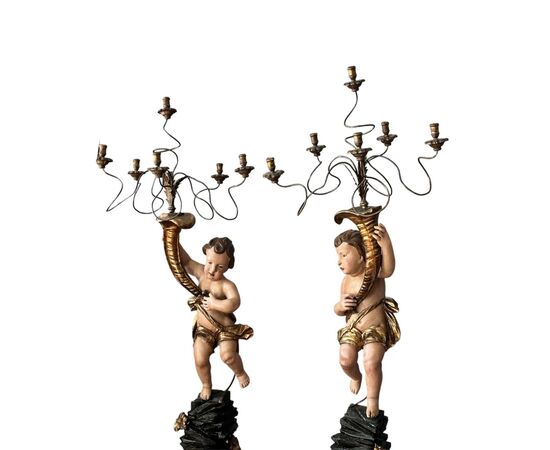 Luigi XIV Coppia di Putti laccati e dorati con Candelabri 