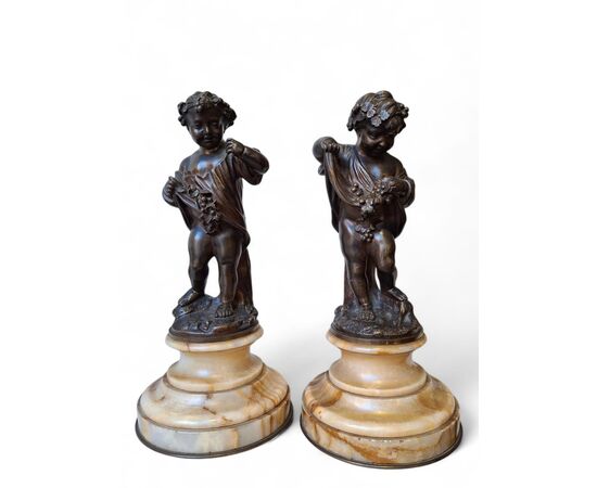 Coppia di putti in bronzo cesellato