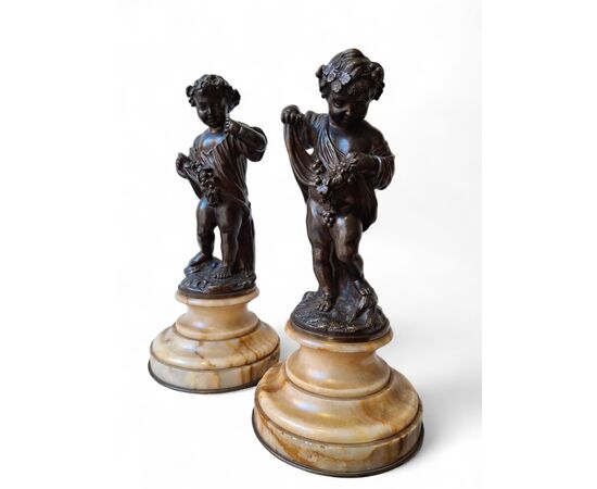 Coppia di putti in bronzo cesellato