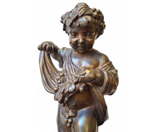 Coppia di putti in bronzo cesellato