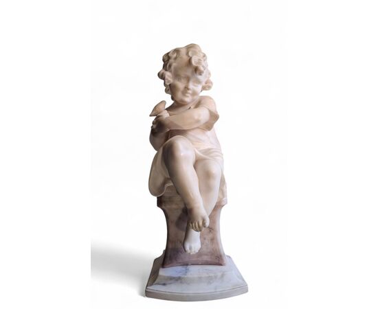 Scultura raffiurante Bambina con uccellino