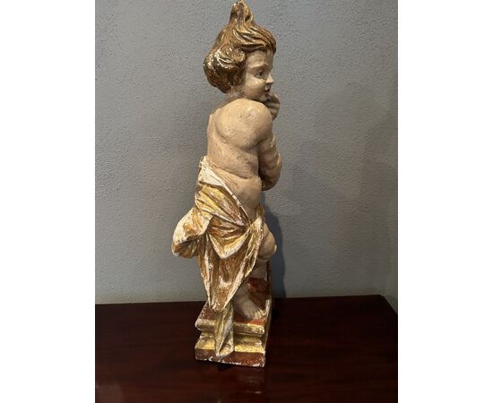 Scultura di legno "Putto degustando miele"