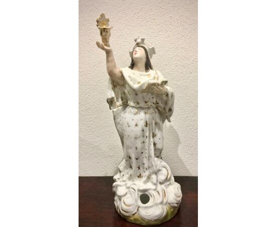 Veilleuse tea pot in porcelain. On figure of Santa holding book and holy water font.Model Jacob Petit.France.     
