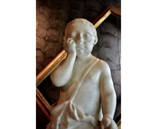 Sculpture of a child in marble     